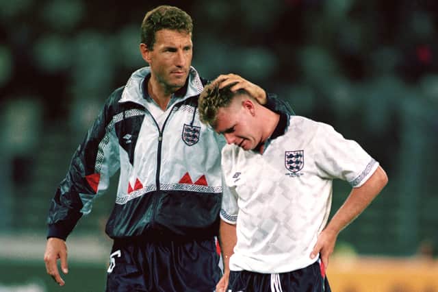 Terry Butcher consoles Paul Gascoigne after England's defeat to West Germany in the 1990 World Cup semi-final