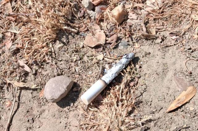 John Niller is having to pay up hundreds of pounds for dropping a cigarette end in Manchester