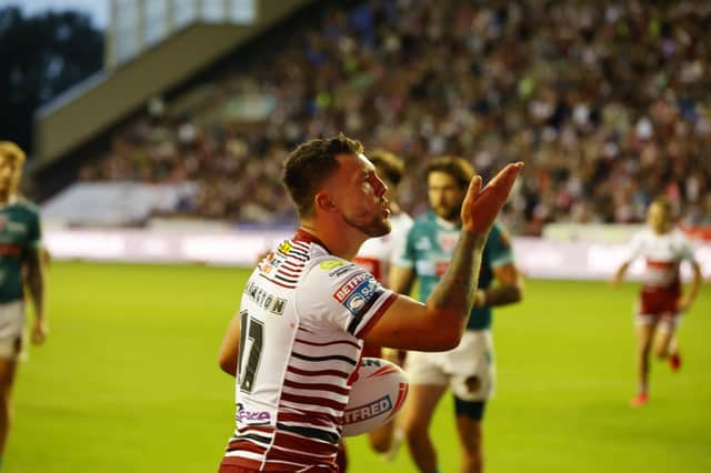 Ollie Partington celebrates a try in Wigan Warriors' win over St Helens