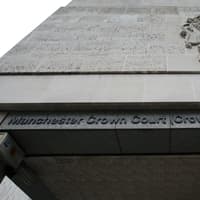 Two false imprisonment charges have been brought against a young Wigan man
