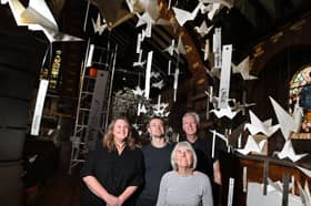 From left, Ruth Atherton, Joe Kiney Whitmore, Susan Whittle and Brian Whitmore, are preparing a murmuration of over 500 paper birds, created by members of the community and assisted by volunteers, to form an art installation in celebrations of the 150th anniversary of St Elizabeth's Church, Aspull. 