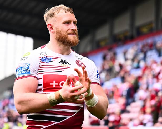 Luke Thompson applauding the Wigan Warriors fans