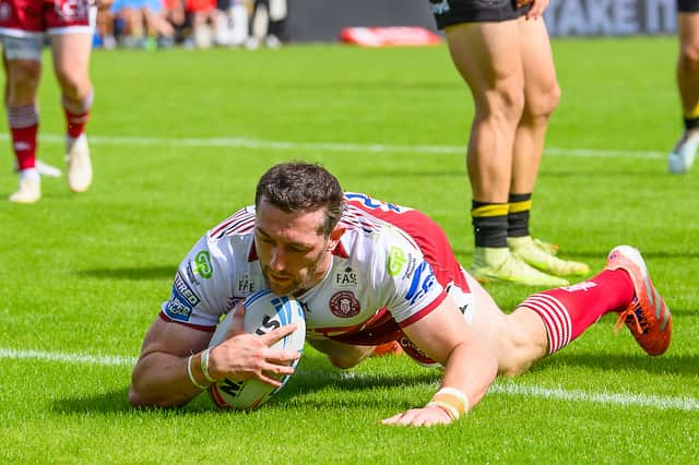 Jake Wardle scoring a try for Wigan Warriors