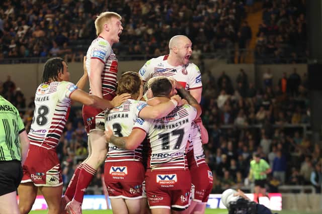 Wigan Warriors celebrate a try in their win over Leeds Rhinos