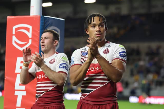 Austin Daniel applauds the Wigan Warriors fans
