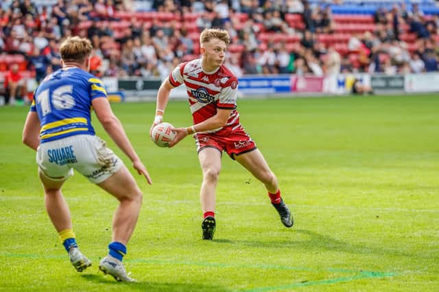 Evan Buckley in action for Wigan Warriors Academy
