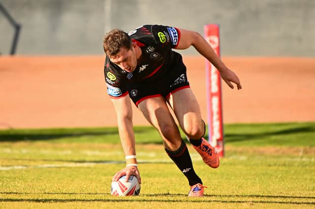 Jake Wardle scoring a try for Wigan Warriors