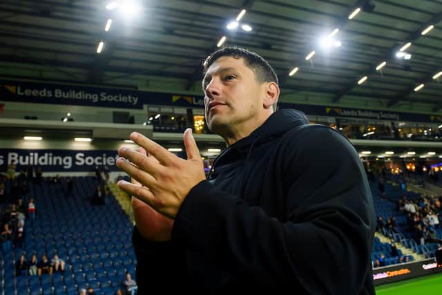 Matt Peet applauds the Wigan Warriors fans following their win over Leeds Rhinos