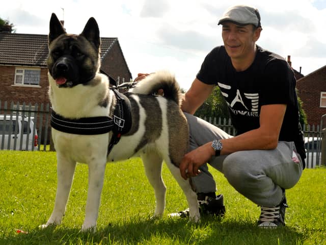 Anthony Turner, from Leigh, with Jess at a dog show in aid of Wigan and Leigh Hospice