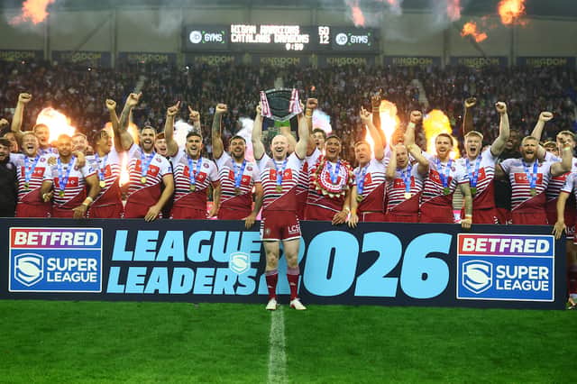 Wigan Warriors captain Liam Farrell lifts the League Leaders' Shield
