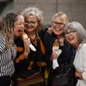 Smiles all round at Wigan's first major Vegan Festival. 