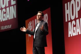 Prime minister Andy Burnham delivering his keynote speech (Stefan Rousseau/PA)