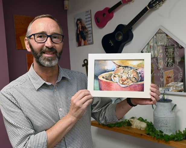 Art teacher Tony Bretherton, pictured, hosts art classes at Sunshine House Community Hub, Wigan.