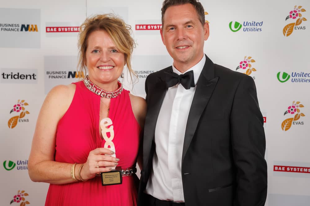 Janine Rees accepts her award from Simon Truby