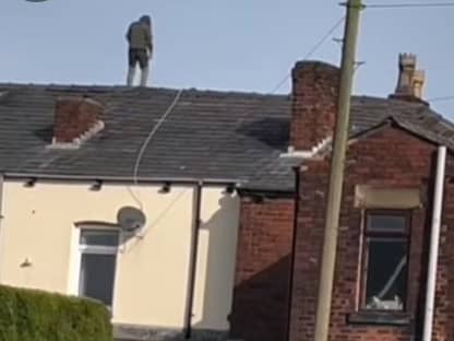 Emergency services descended on Lord Street, Hindley, when a man took to the roof of a property there