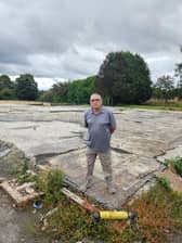 Coun Chris Ready at the former Whelley Labour Club site