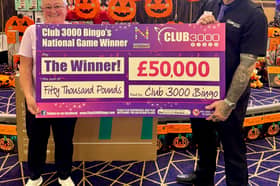 Doreen Caulfield with bingo caller Wayne Mason