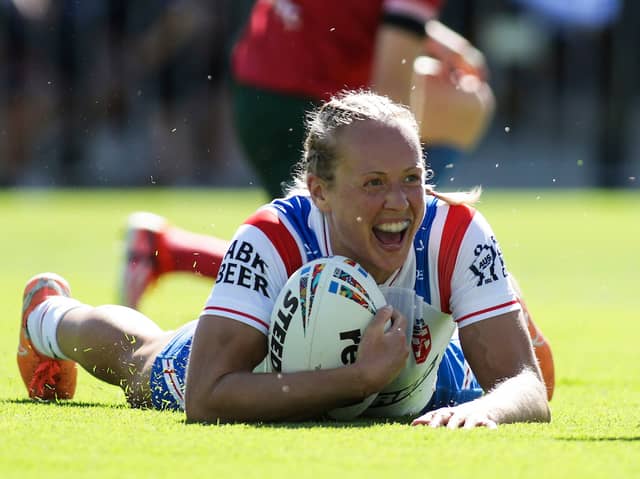 Anna Davies scoring a try in England's win over Wales