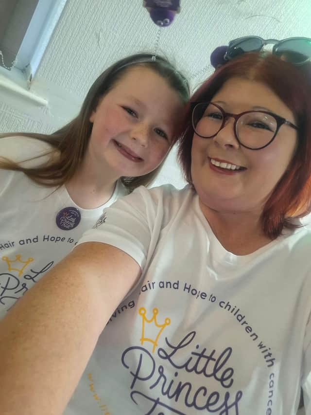 Ellie and her mum before the chop