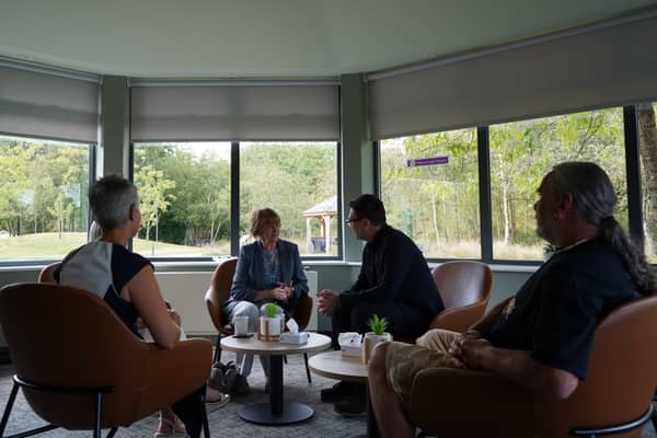 Andy Burnham and John Vickers (right) during a visit to Wigan and Leigh Hospice