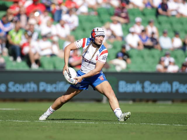Wigan Warriors star Izzy Rowe in action for England against Wales
