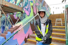 George Rose at her mural next to the steps at Greensway shopping centre
