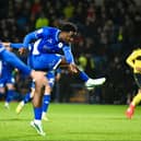 Christian Saydee fires home Wigan's equaliser
