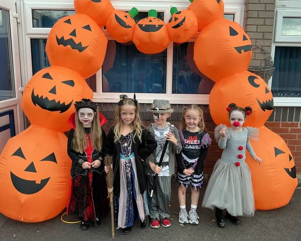 Posing with pumpkins 