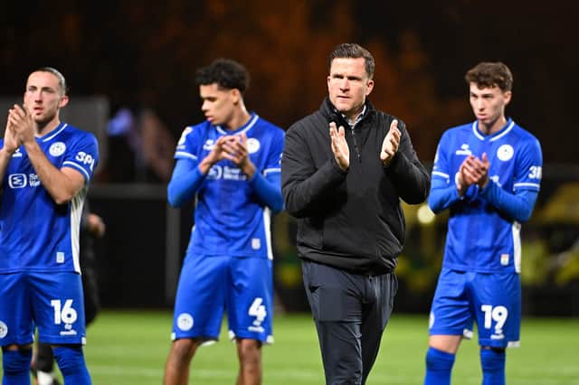 Gary Caldwell and his players thank the fans that travelled to Oxford