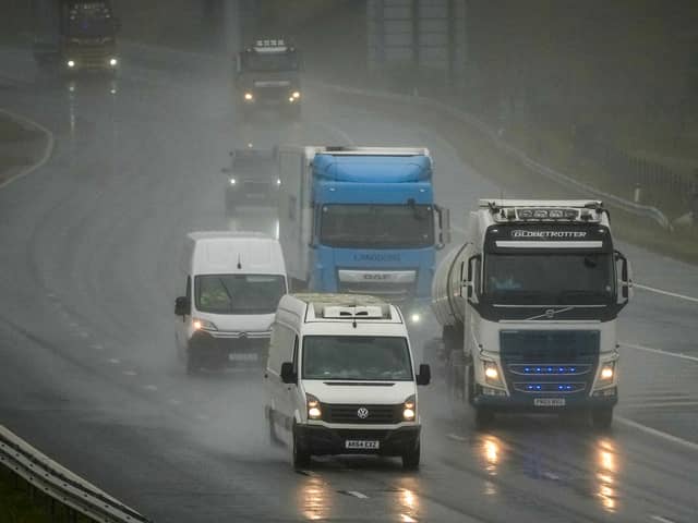 Motorists on the M6 motorway at Shap Summit drive in heavy rain and spray on 20 August 2026 in Penrith, United Kingdom.