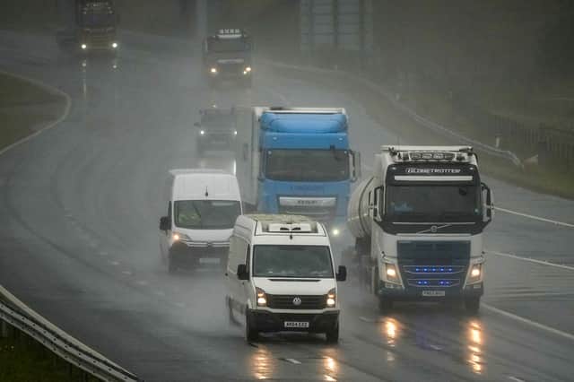 Motorists on the M6 motorway at Shap Summit drive in heavy rain and spray on 20 August 2026 in Penrith, United Kingdom.