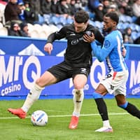 Wigan Athletic remain rooted to foot of League One after Huddersfield Town defeat