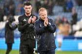 David Perkins was in the technical area for Latics at Huddersfield due to Gary Caldwell's touchline ban