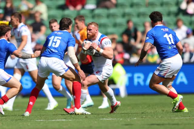 England prop Luke Thompson on the charge against France