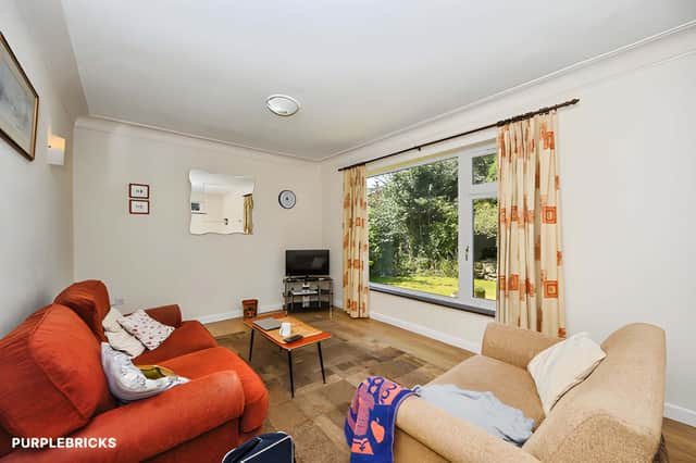 A spacious living room gives the household a generous place to relax