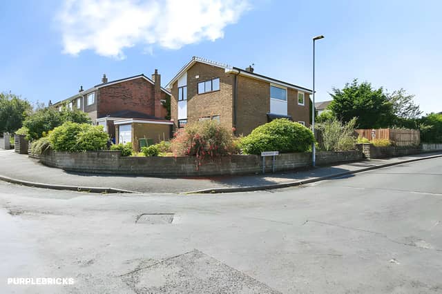 The detached house sits on a generous corner plot, with a driveway and attached garage adding off-road parking and practical storage.