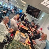 A war memorial featuring hundreds of poppies knitted by volunteers is set to be unveiled in Wigan