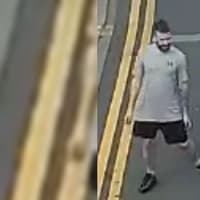 A security guard was assaulted as he tried to recover goods stolen from a shop in Wigan town centre