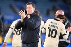 Gary Caldwell applauds the Wigan Athletic supporters following their defeat at Leicester City