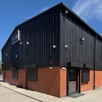 A 24-hour Wigan gym which opened without planning permission is backed after an emotional plea from its owner
