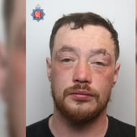 Police say a 31-year-old man wanted on recall to prison has links to Wigan and Leigh