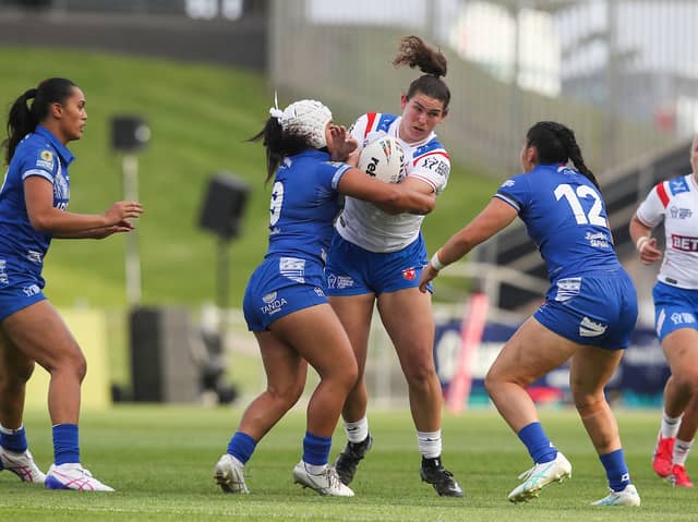 Wigan Warriors forward Meg Williams in action for England against Samoa