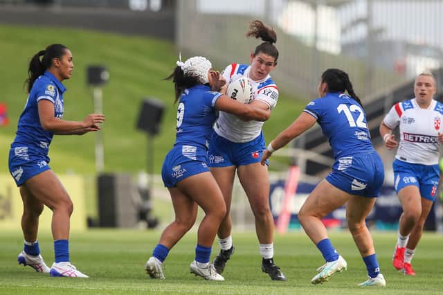 Wigan Warriors forward Meg Williams in action for England against Samoa