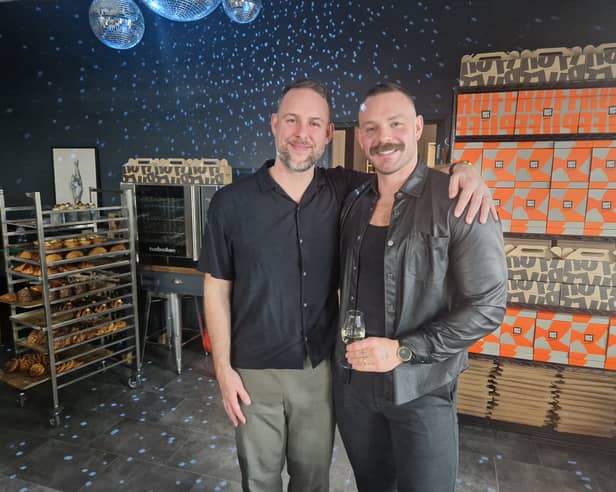 John Whaite (right) with husband Paul at the new Ruff Puff Bakehouse