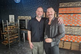 John Whaite (right) with husband Paul at the new Ruff Puff Bakehouse