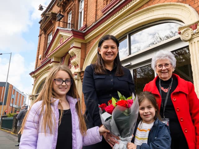 Evie and Emma Johnson presented flowers to Lisa Nandy with chair Anne Woolley