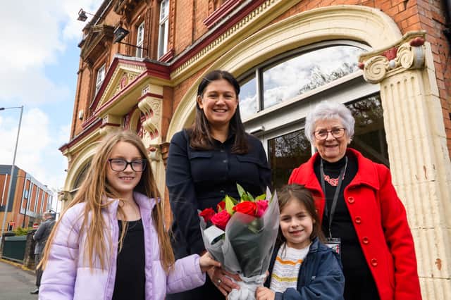 Evie and Emma Johnson presented flowers to Lisa Nandy with chair Anne Woolley