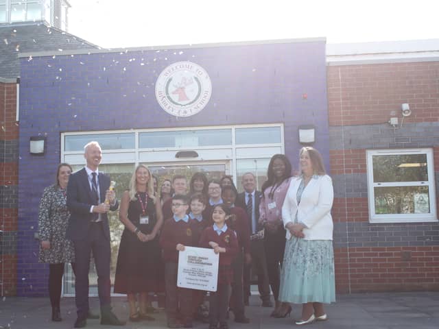Staff and pupils celebrate