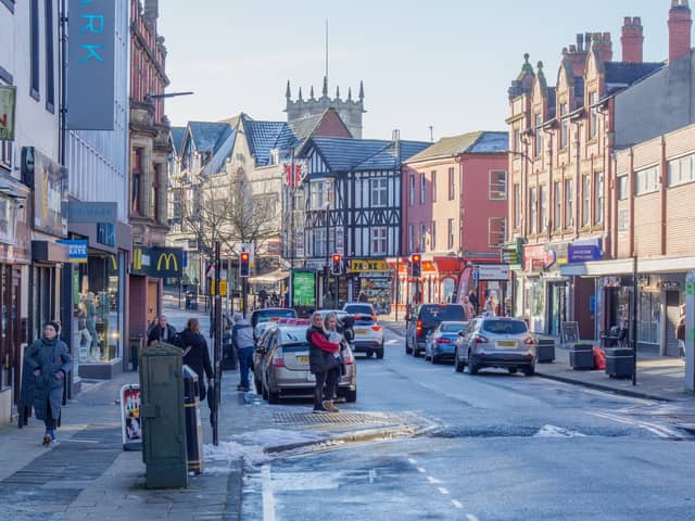 People shopping in Wigan town centre