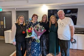 Lisa Phillips–Fold, executive assistant; Karen Strong, volunteer fund-raiser; Jane Webb, marketing manager; Keely Dalfen, CEO, and Lawrence Hoy from The Buskers